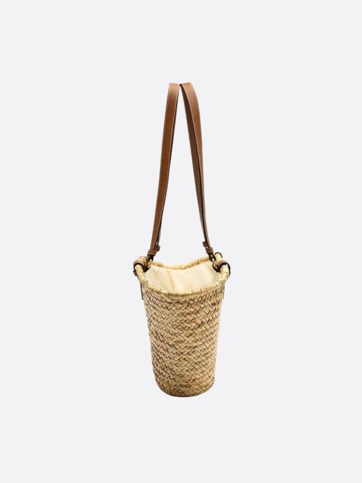 Straw basket with leather handle